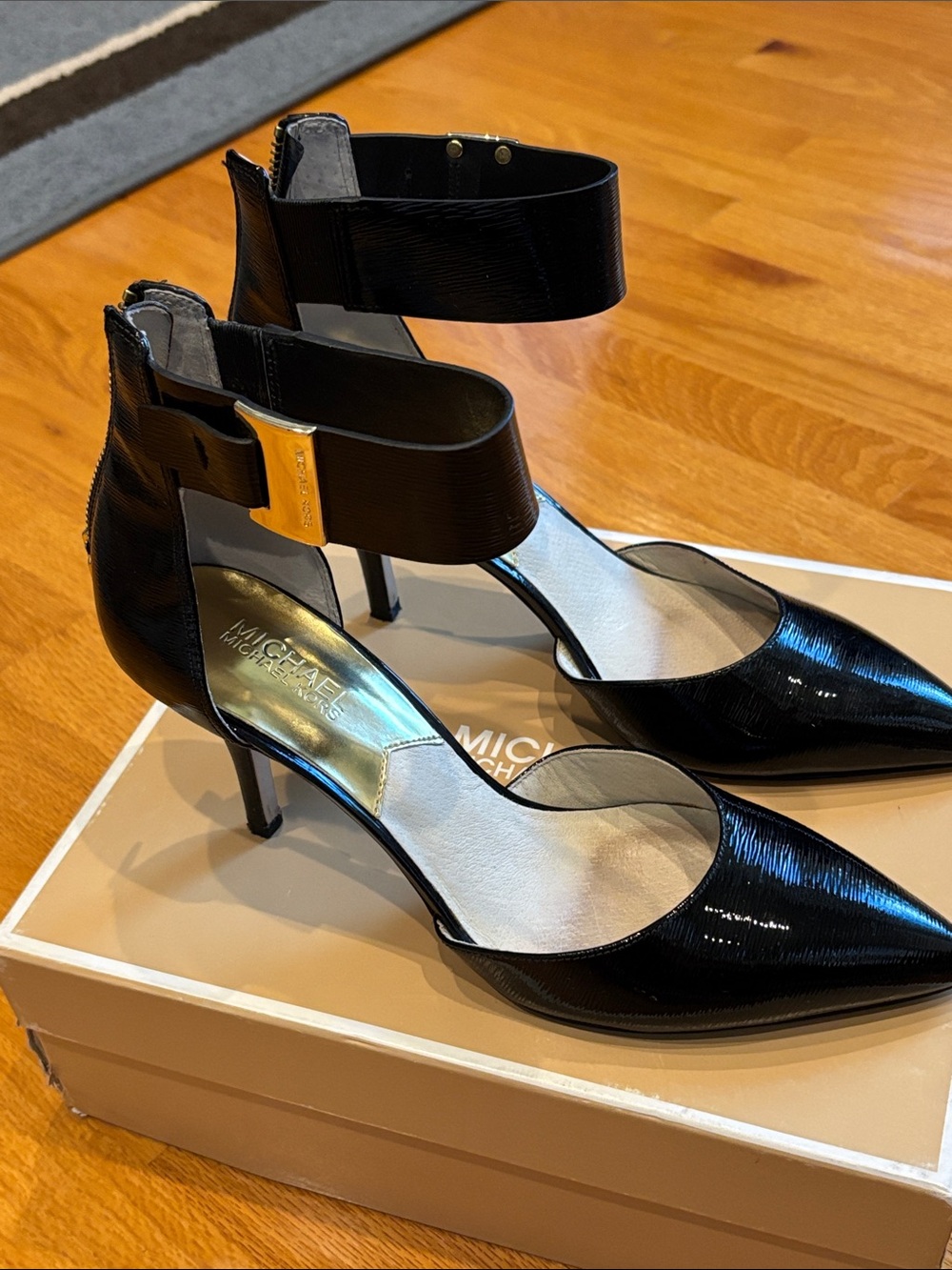 Michael Kors Black Pointed Ankle-Strap Pumps with Gold Accent